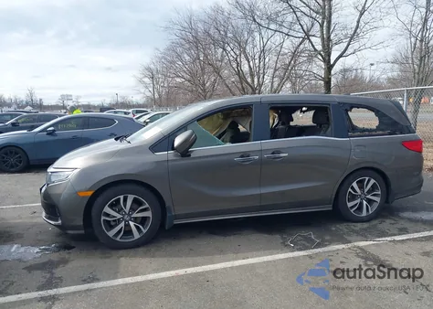 2021 Honda Odyssey Touring z USA, uszkodzony, nr VIN 5FNRL6H8XMB006701